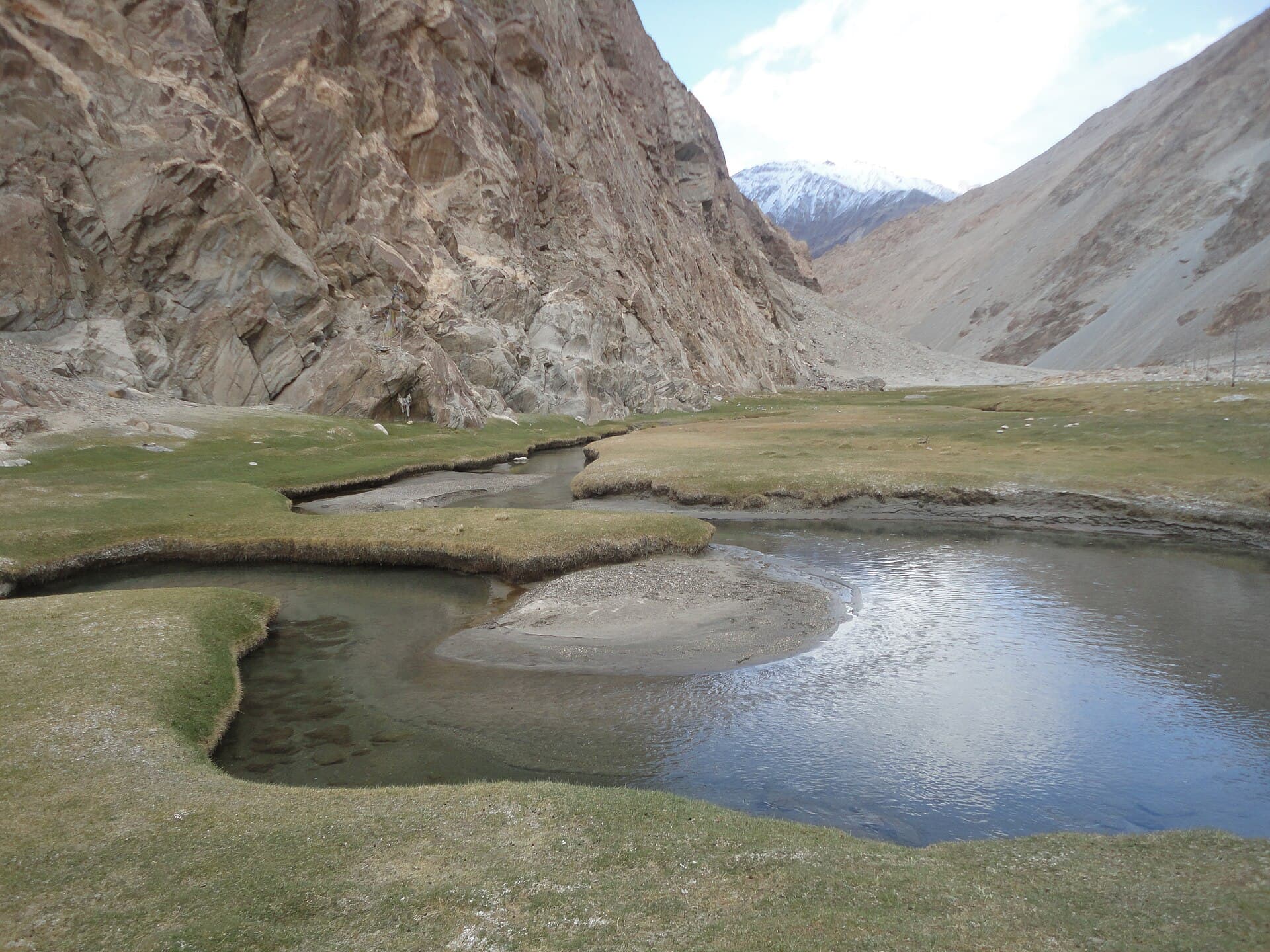 A stream running down from bare mountains in Ladakh